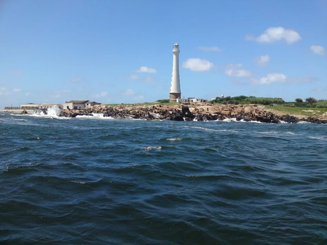 Isla de Lobos lighthouse seen from the boat on the tour from Punta del Este
